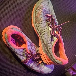 Woman's grey and pink under armor sneakers